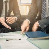 Two lawyers in Dothan, Alabama going over a wrongful death case.