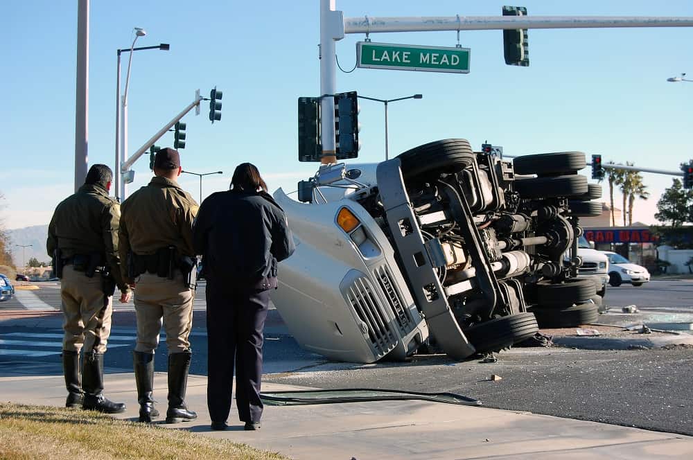 Truck accident happening along the highway of Alabama.
