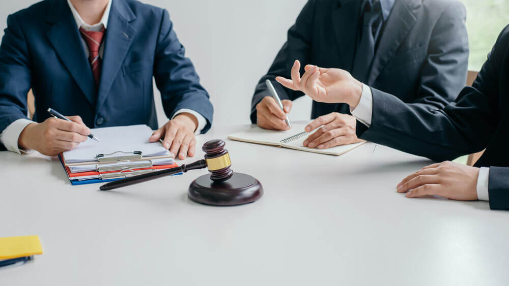 Client giving a deposition to personal injury lawyer.